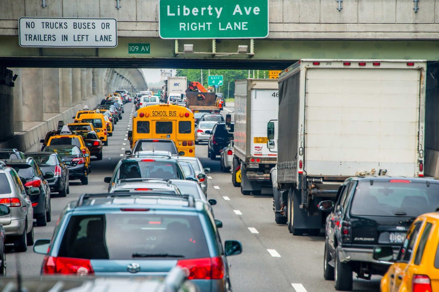 Traffic is high. Three Lane Highway (2005). Traffic Jam Front. New Jersey Traffic. Billboard on Highway.