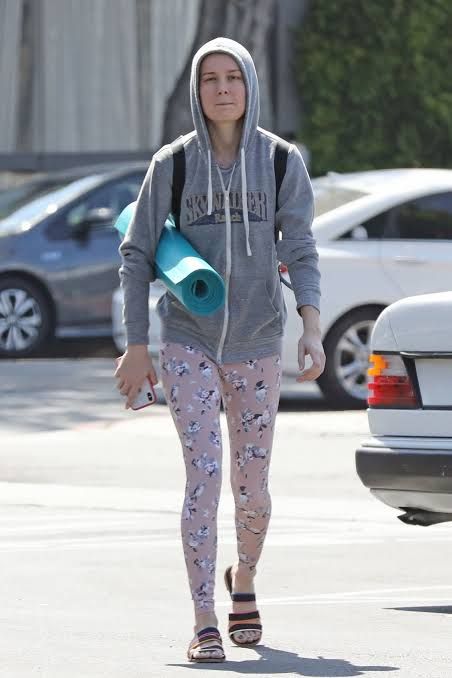 Katy Perry leaves a yoga studio wearing dark blue sports bra and matching  leggings in Los