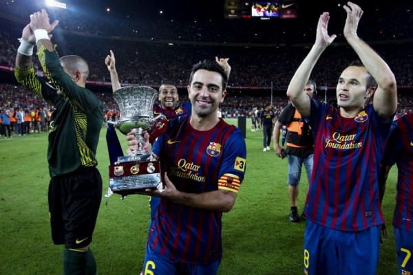 Duet Xavi dan Iniesta Bisa Ancam Posisi Koeman di Barcelona