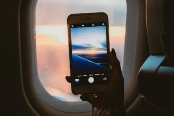 5 Tips Memotret dari Dalam Kabin Pesawat, Matikan Fitur Flash