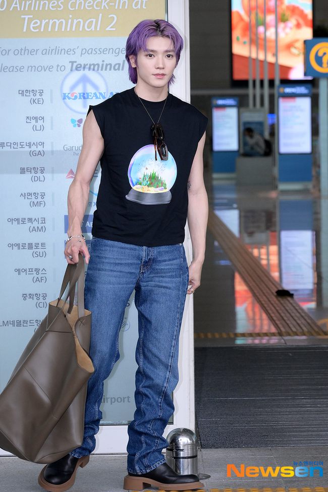 10 Gaya Airport Fashion ala Taeyong NCT, Fashionable dan Hype