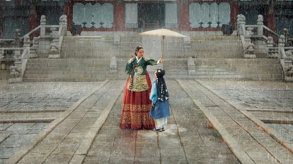 Under the Queen's Umbrella