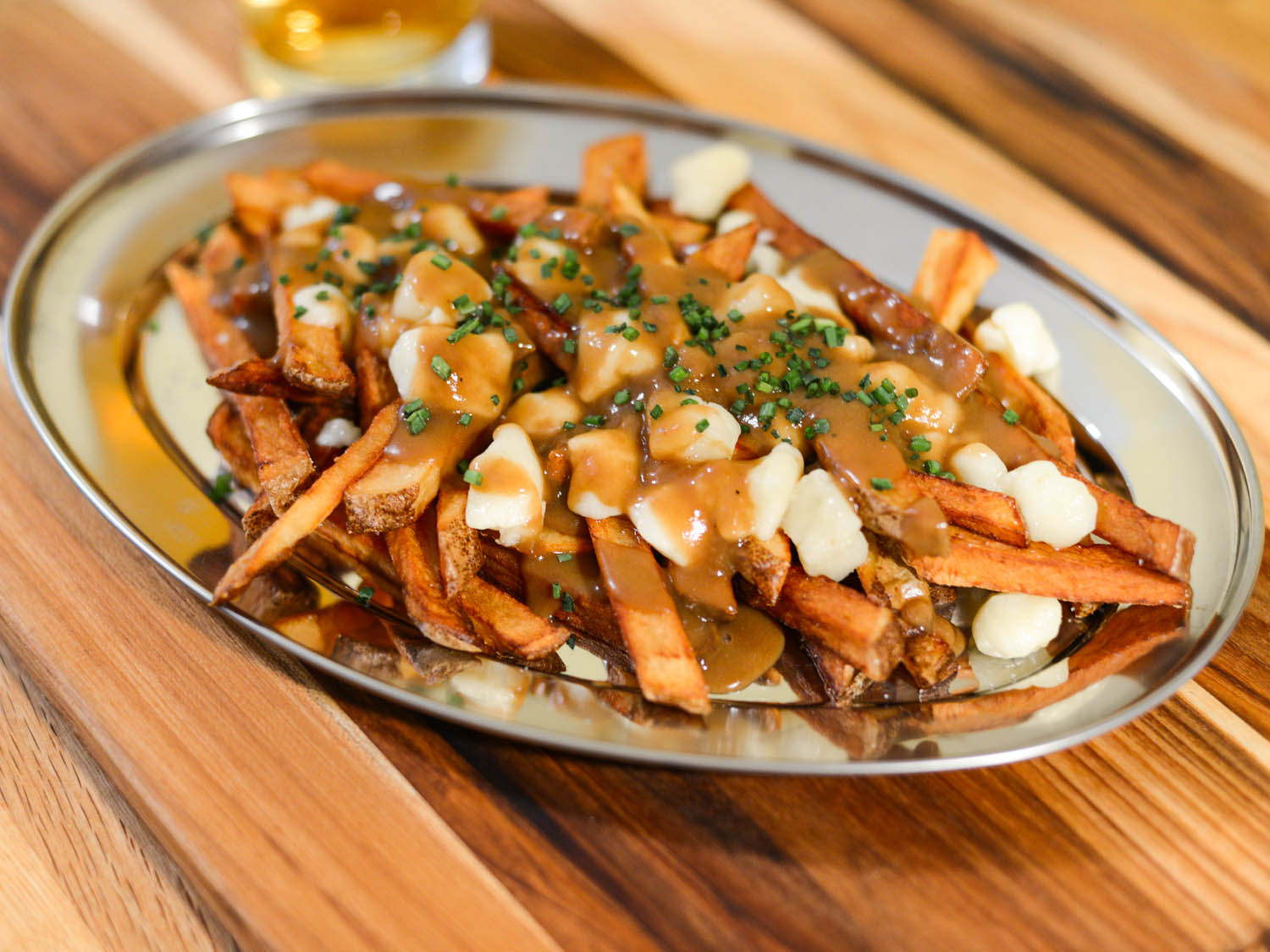 20150327-poutine-joshua-bousel-01c6ff7d631edbc36df943cbb239a055.jpg