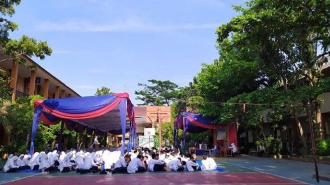 Pemkot Palembang Larang Pelajar SD - SMP Pakai Jas, Ini Alasannya
