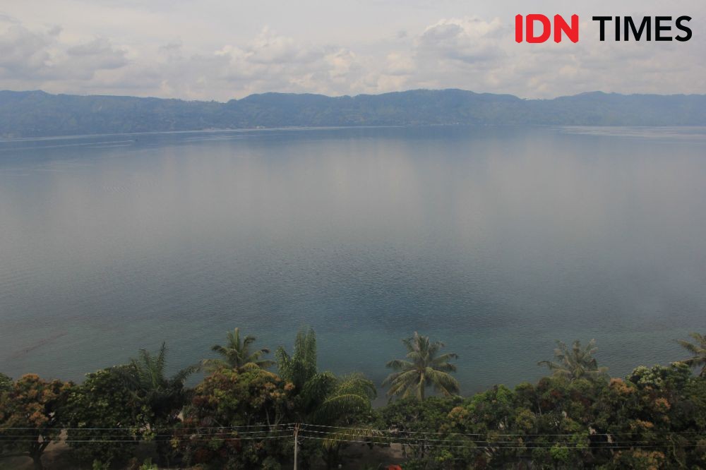 Foto-foto di Pinggir Danau Toba, Bocah 8 Tahun Jatuh dan Tenggelam