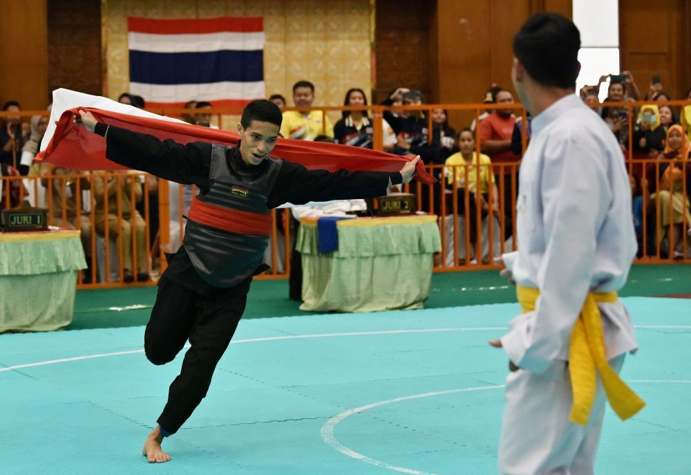 [FOTO] Aksi Pesilat Indonesia di Ajang ASEAN School Games 2019