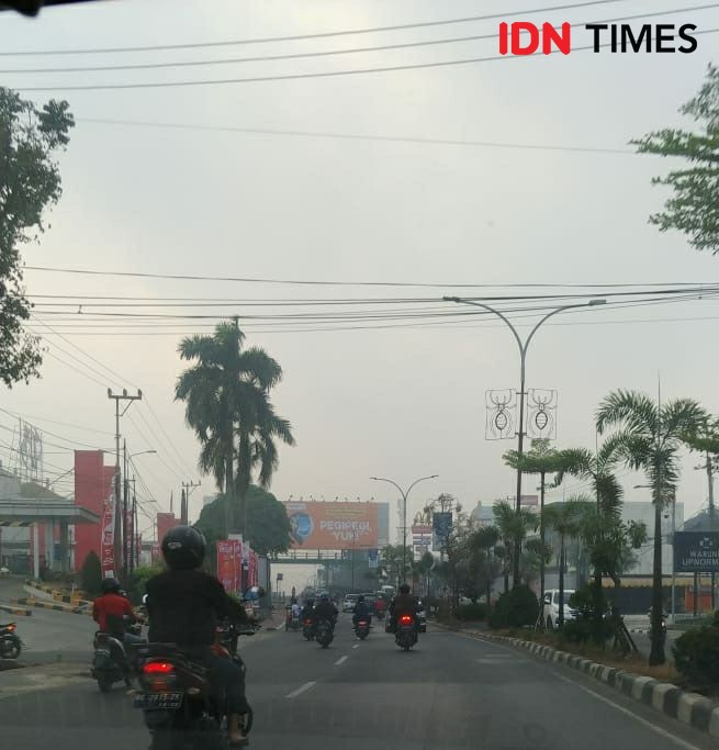 Kabut Asap Kepung Palembang, Warga Diimbau Pakai Masker & Banyak Minum