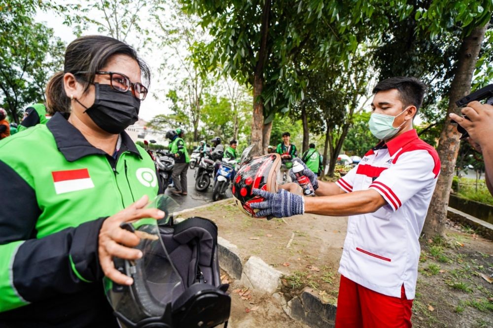 Gojek Sanitasi Kendaraan dan Bagikan Ribuan Antiseptik di Medan