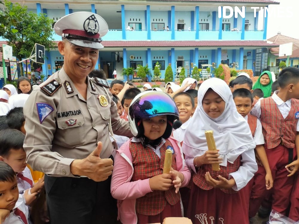 Mengenal Aiptu M Muhtasor, Sahabat Anak Selama 20 Tahun di Palembang