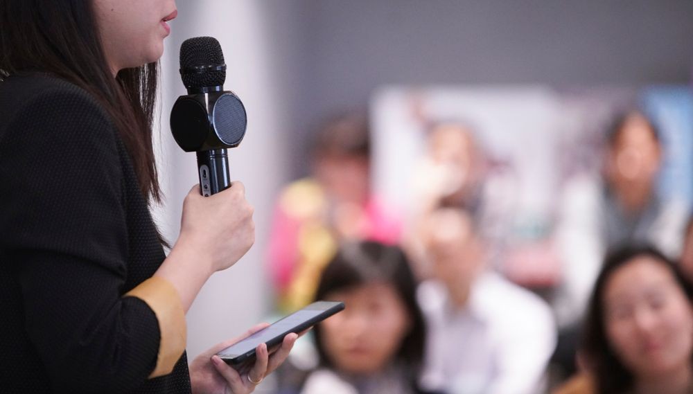 The female speaker. Female Speaker stock.