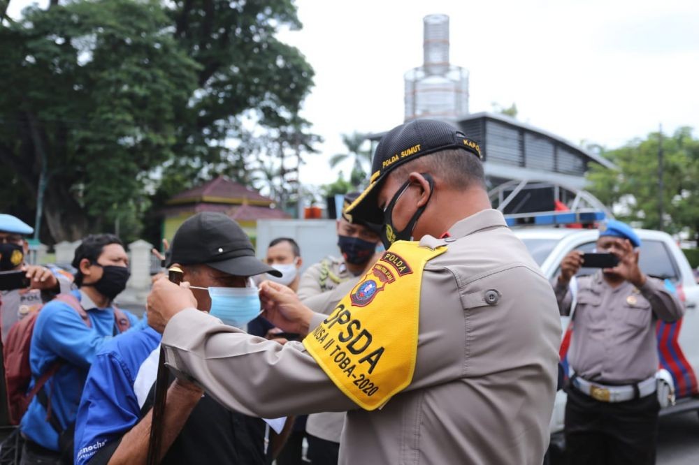 Gak Pakai Masker, Siap-siap Didenda Rp300 Ribu dan Dihukum Polisi