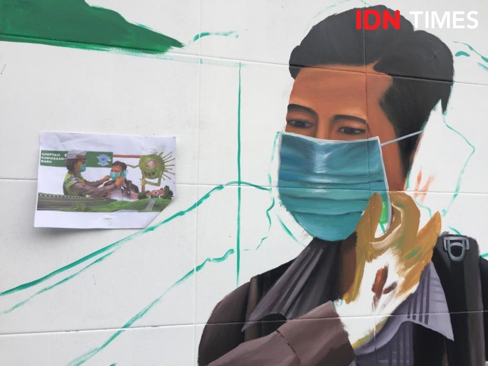 Generasi Millenial Medan Ingatkan Warga Pakai Masker Lewat Mural