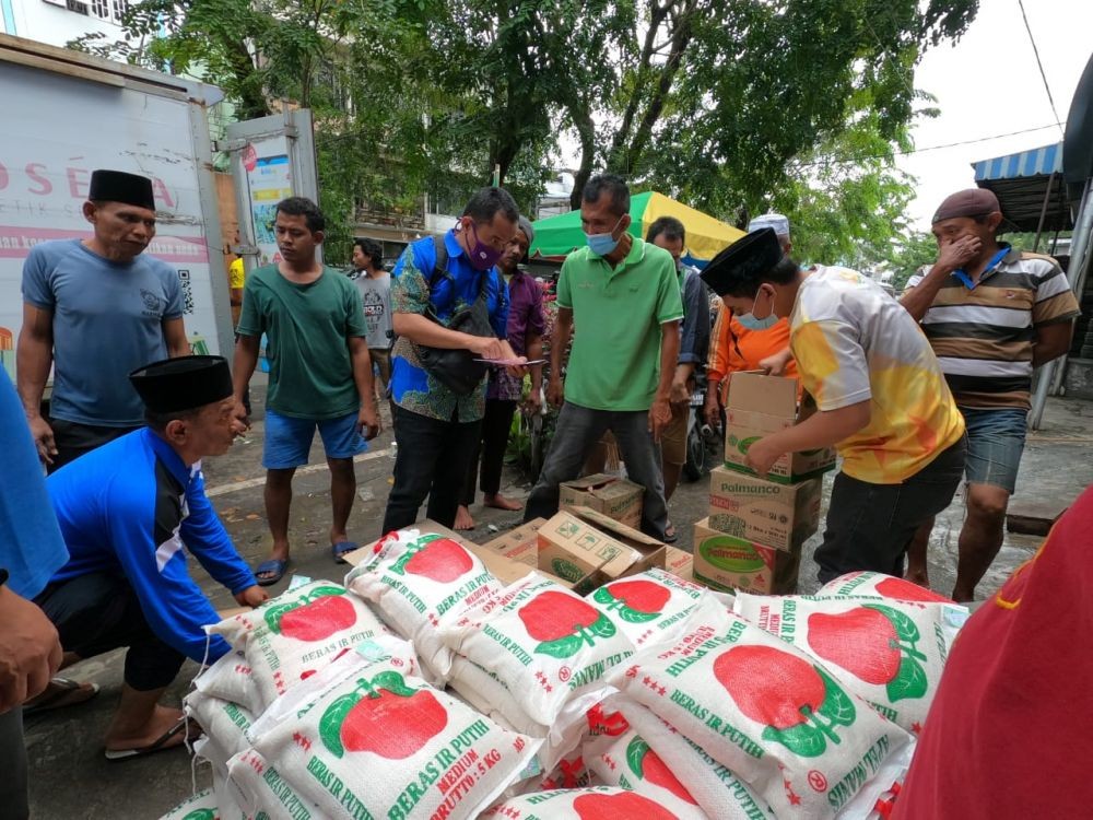 MTXL Axiata dan PFI Medan Salurkan Bantuan untuk Korban Banjir Medan
