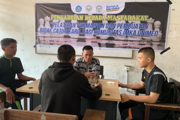 Tim PKM Unimed Berupaya Memasyarakatkan Permainan Catur Karo