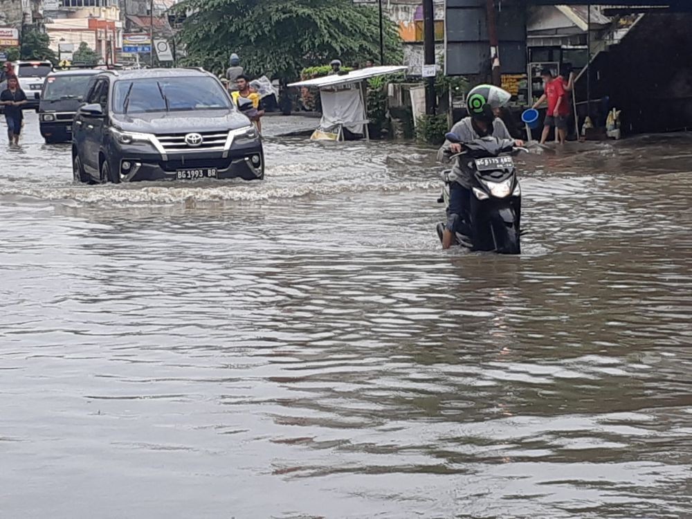 Banjir Palembang Memakan Korban, Seorang Warga Hilang Terseret Arus