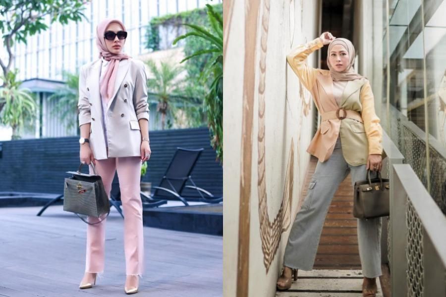 10. Style ala lady boss, Syahrini mengenakan blazer dengan celana dan hijab...