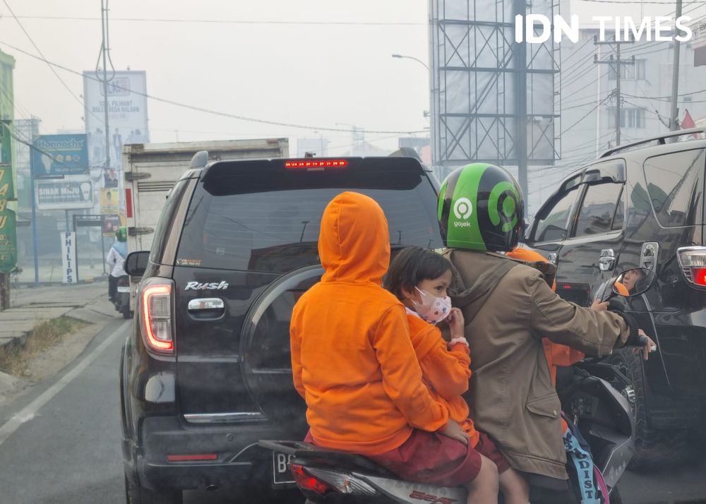 Suka Cita Turun Hujan di Palembang, Warga Berharap Asap Segera Hilang
