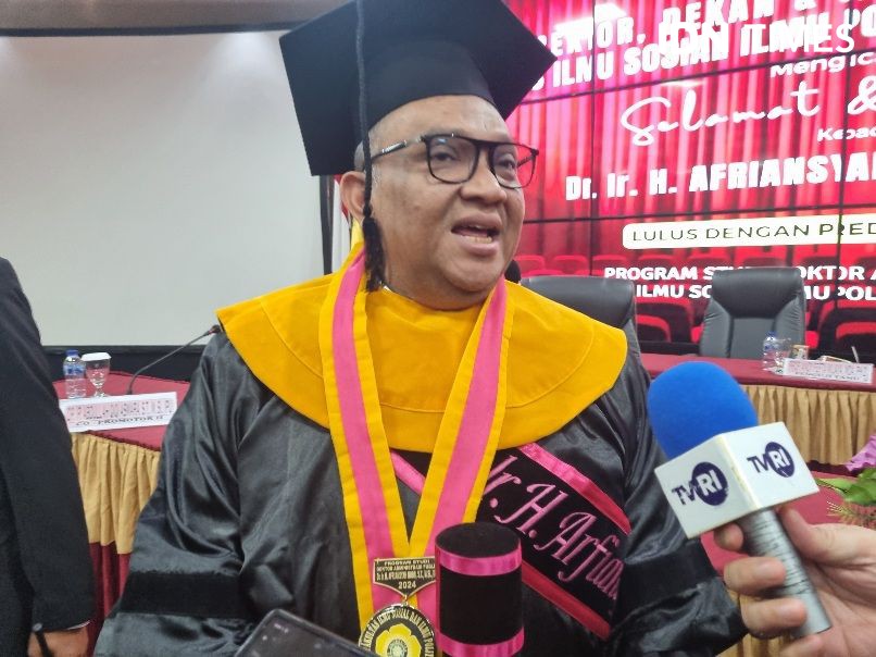 Wamenaker Afriansyah Noor Raih Doktor dari Universitas Sriwijaya